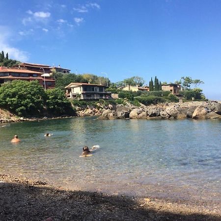 Appartamento "Casa Girasole" Con Accesso Diretto Alla Spiaggia Порто Санто Стефано Экстерьер фото
